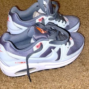Nike boys grey and orange sneakers.